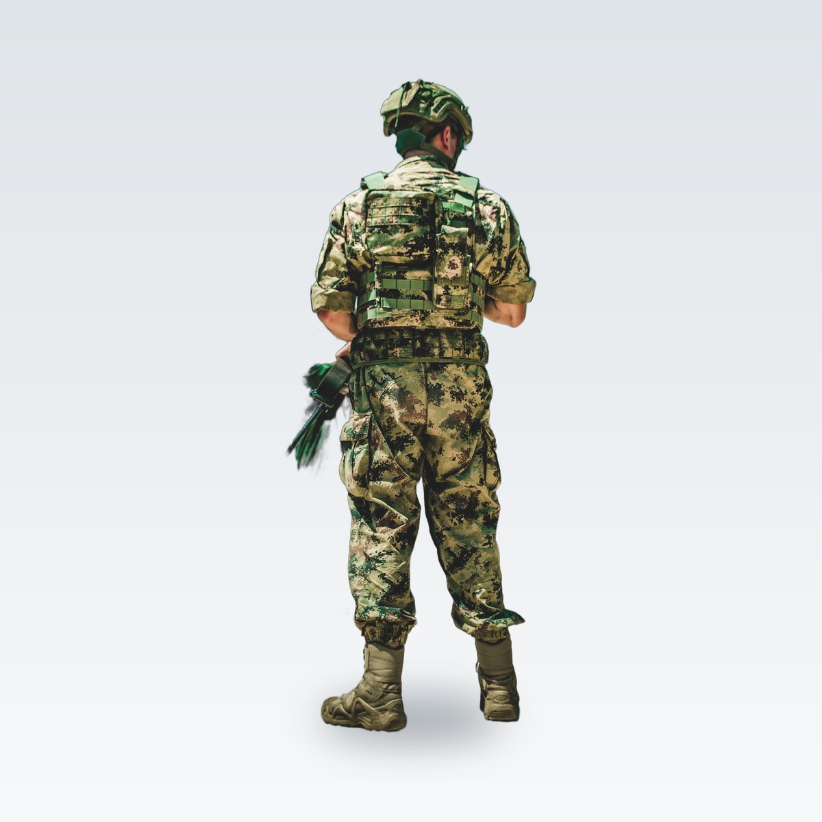 A camouflage uniform with boots, seen from behind